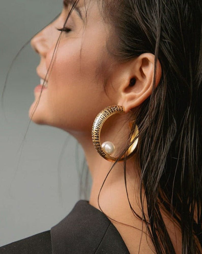 A Giant Pearl in a Hoop