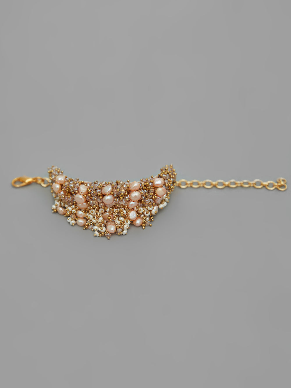 Amama,Contemporary Peach Pearl Studded Bracelet With Gold Beads
