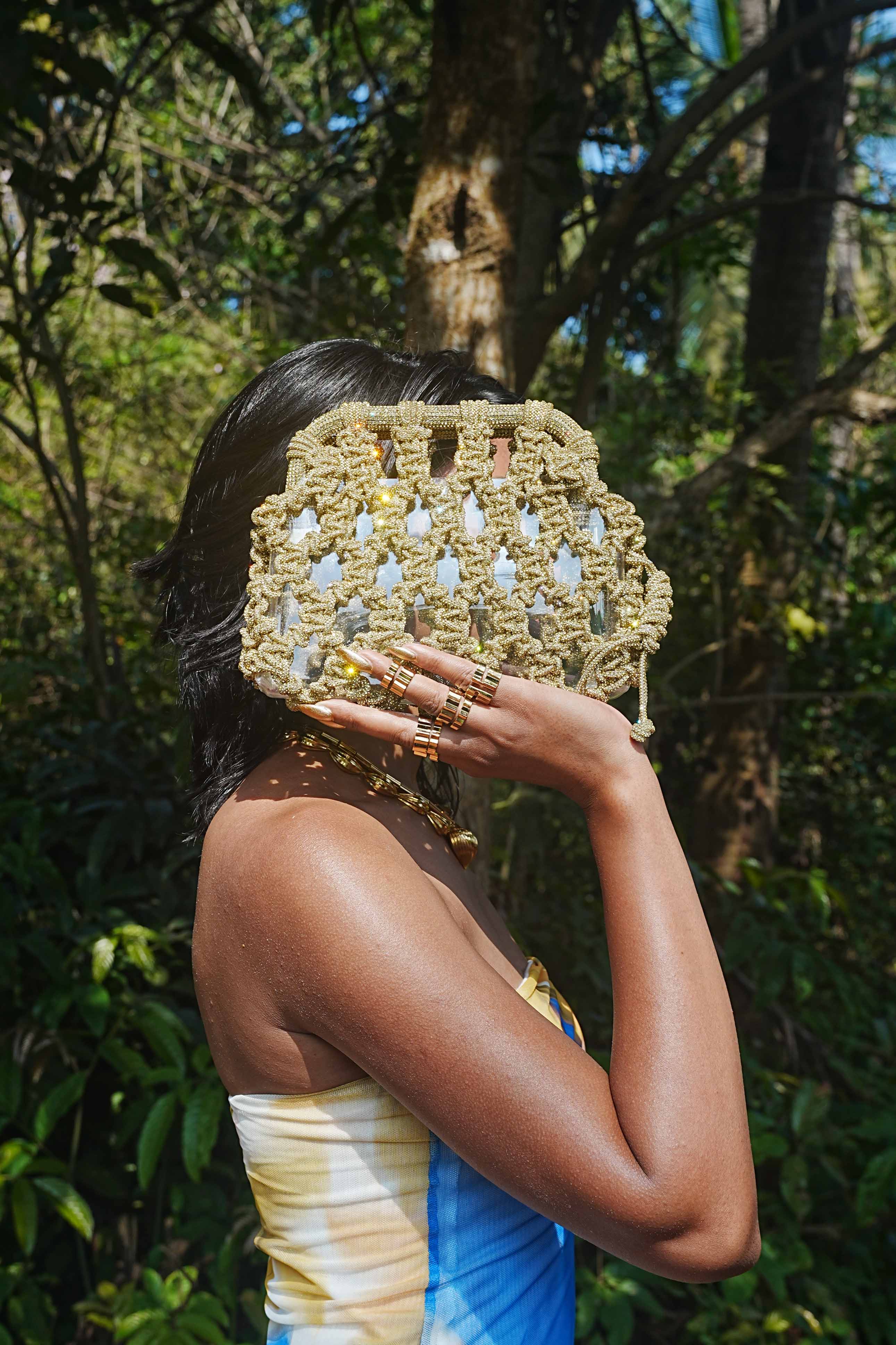 Luna Plaided Clutch In Light Gold – Amama