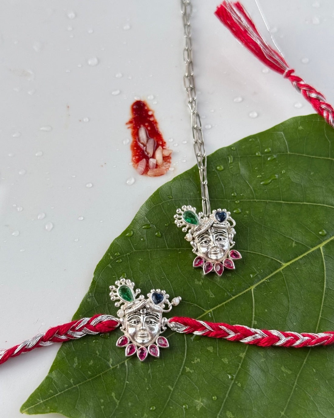 PAIR OF SHREENATH SWAROOP RAKHI AND LUMBA IN SILVER